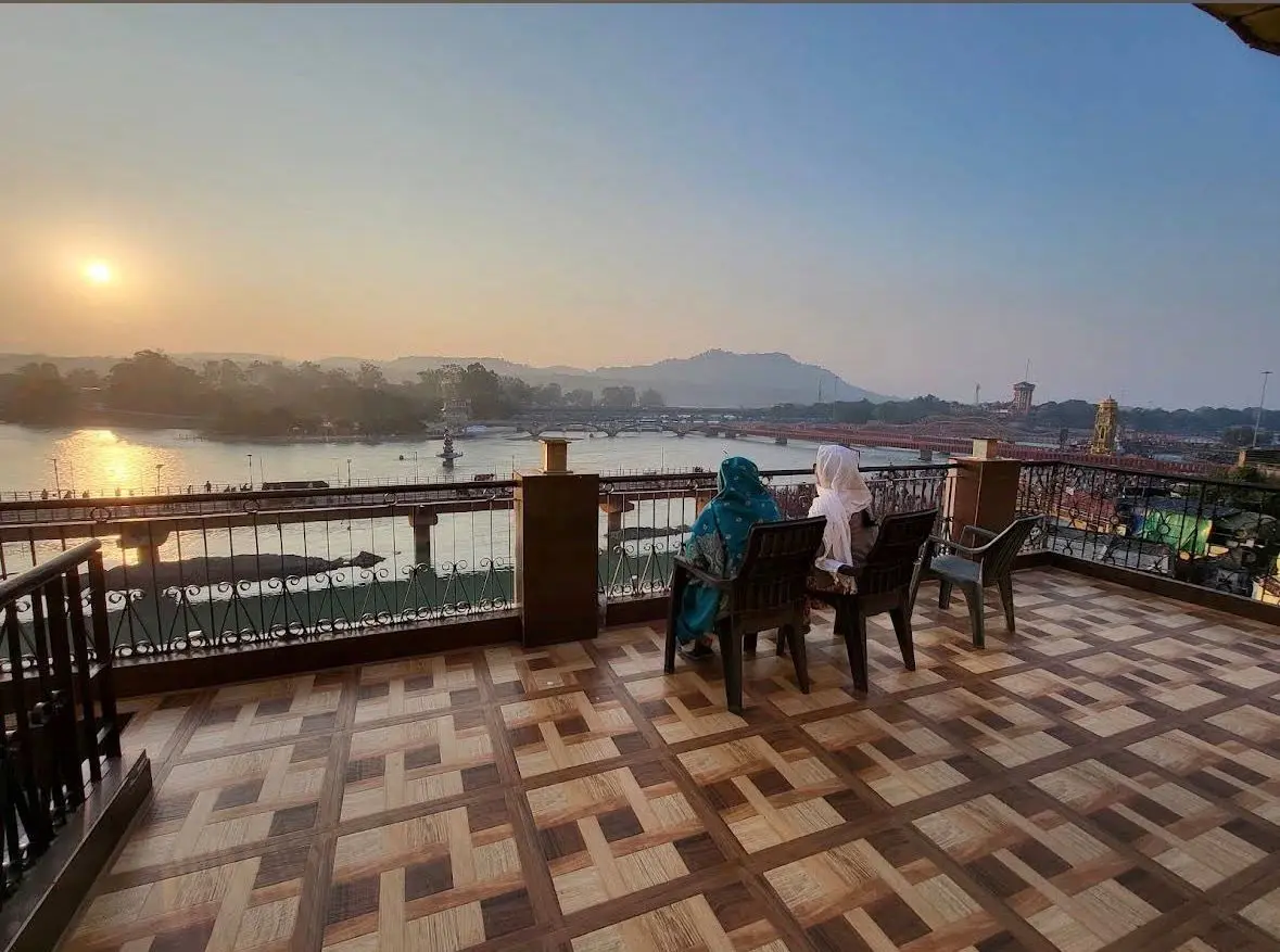 Rooftop Ganga river view from Haridwar hotel ideal for spiritual stay and evening aarti